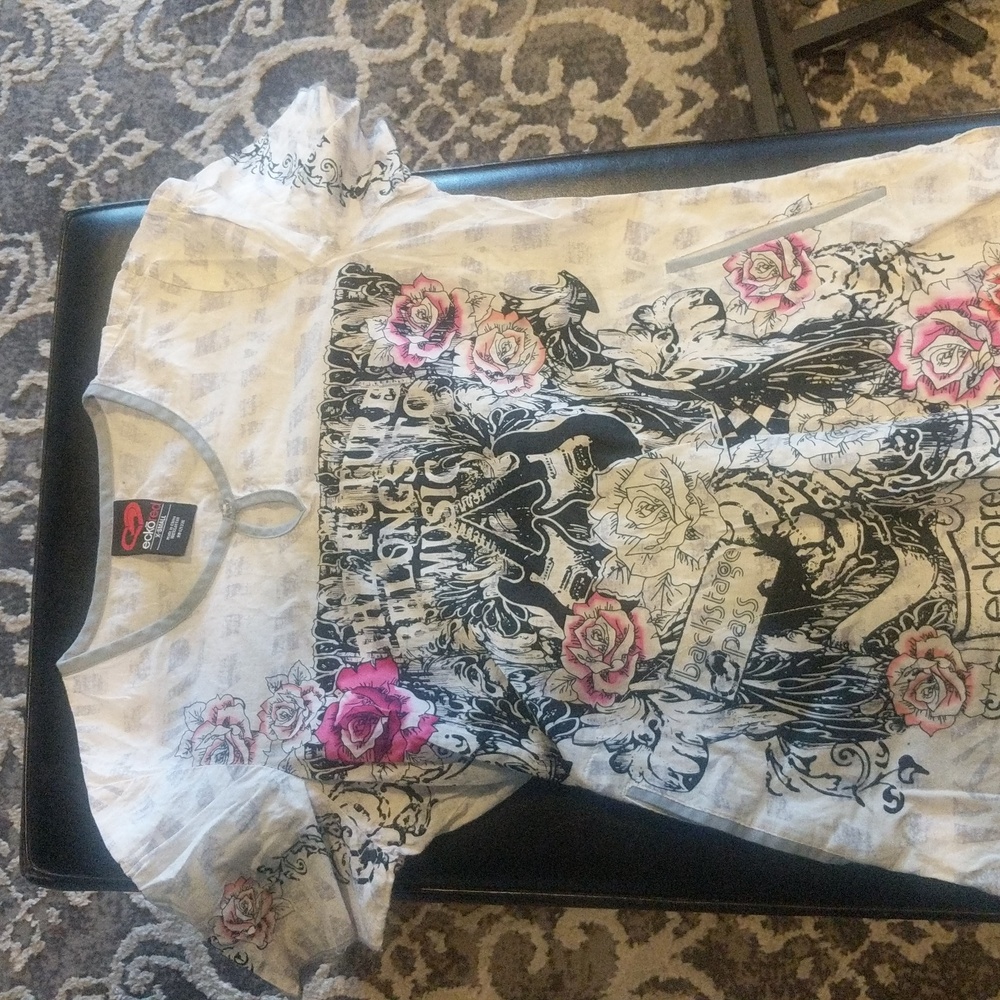 Ecko Red size XS scrub top. Has been gently worn.